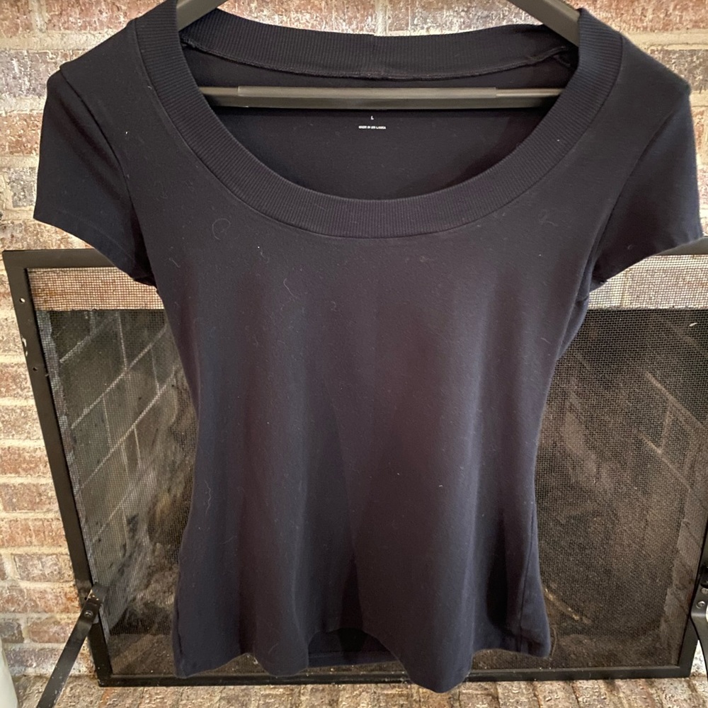 Black form fitting shirt